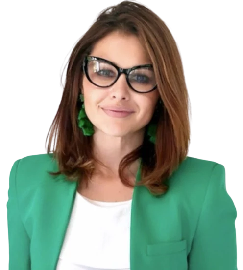Woman in green blazer and glasses